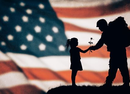 American soldier silhouette on the american flag