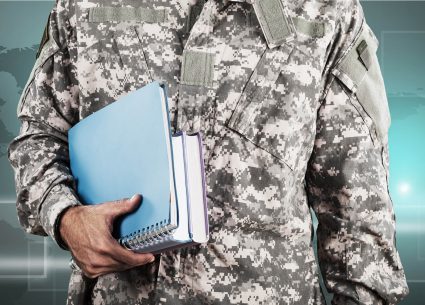 Soldier holding notebooks